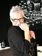 Horny mature lady getting herself wet