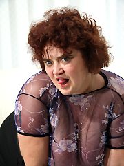Big mature mama showing off her body