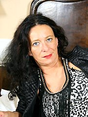 Naughty housewife playing on her bed