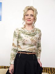 This naughty mature lsut plays with her toy boy