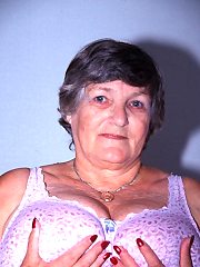 Horny fat granny spreads her nasty big folds