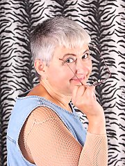 Hairy mature lady playing with herself