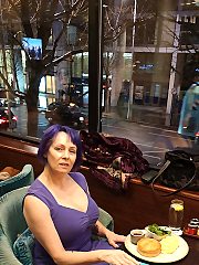 Big breasted mature lady playing with her pussy