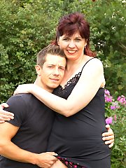 Naughty housewife playing with her toyboy outside