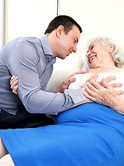 Horny toy boy playing around with a hairy granny