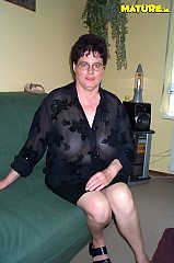 This big titted mature slut loves playing with herself