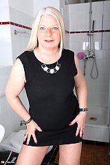 Porn with blonde woman over 50 pleases cunt in shower