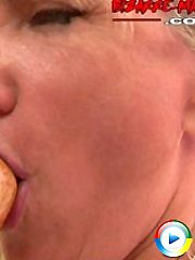 Horny mature slut masturbating with a baseball bat