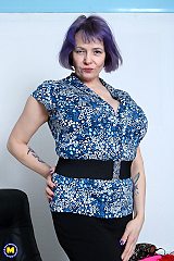 Big breasted mature lady playing with her pussy