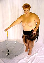 Chubby blonde poses her fat juicy plump tits