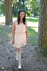 Hot innocent babe getting seduced by a horny mature lesbian in the park