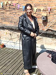 Kinky mature slut naked on a roof